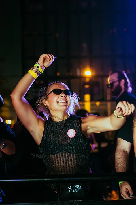 A fan in sunglasses at III Points 2025